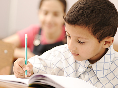 Young student demonstrating education in action